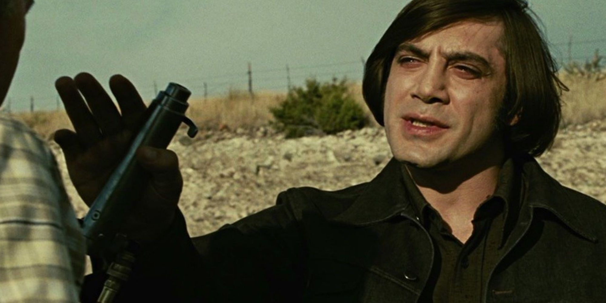 No Country for Old Men - Two characters are talking to one another.