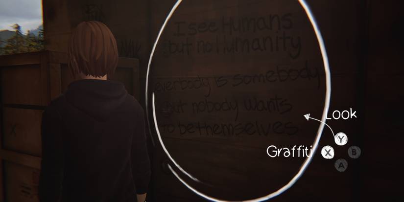 Chloe looking a wall with writing on it inside a train carriage during Episode 1 of Life is Strange: Before the Storm Remastered