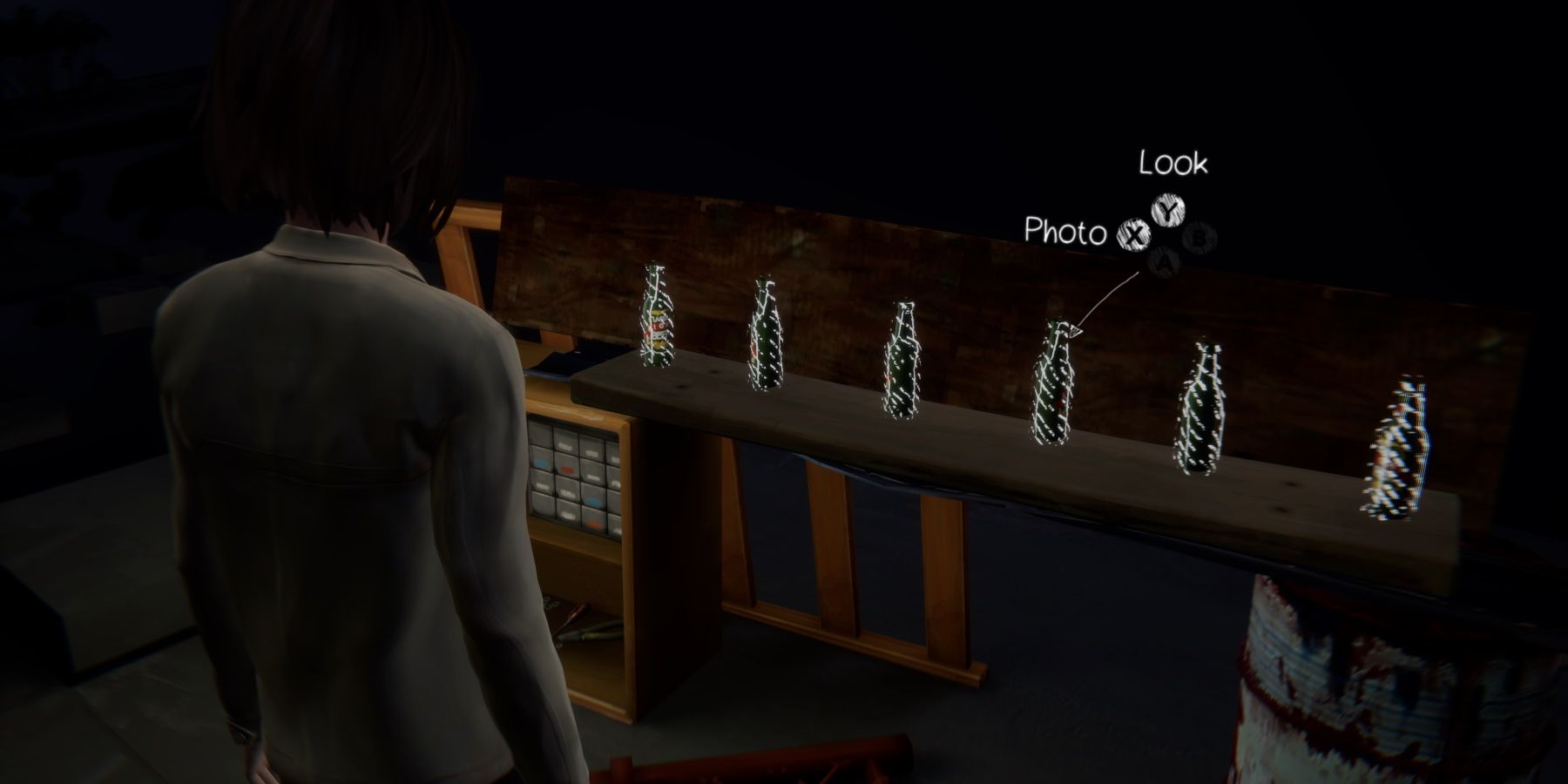 Max looking at glass bottles lined up during episode 5 of Life is Strange