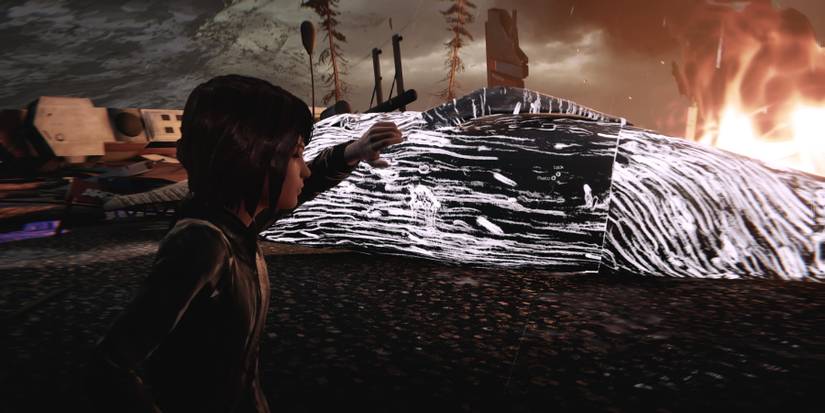 Maz looking at a dead whale on the road during episode 5 of Life is Strange