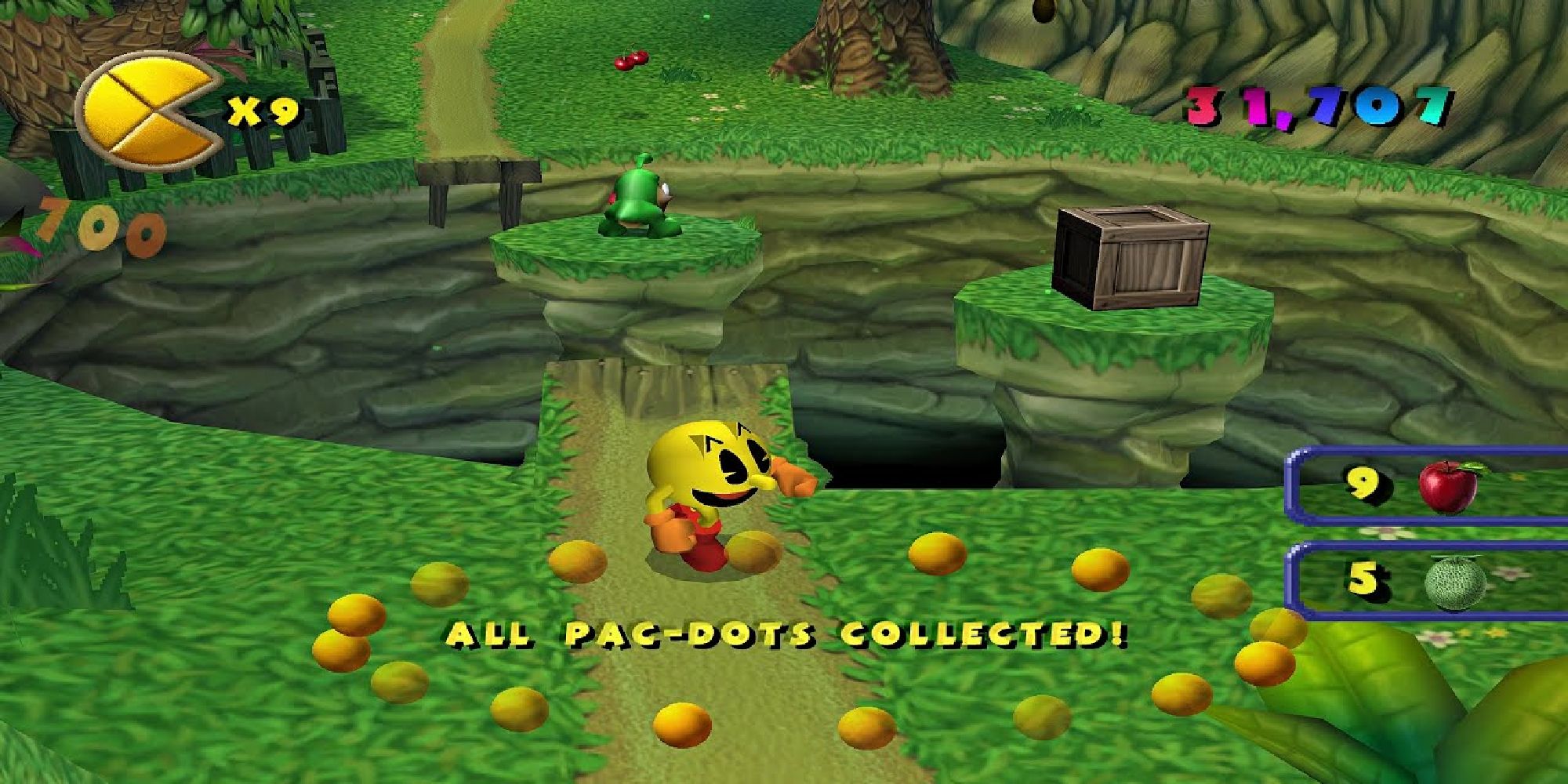 Pac-Man собирает pac-точки во время уровня в Pac-Man World 2 для PS2.