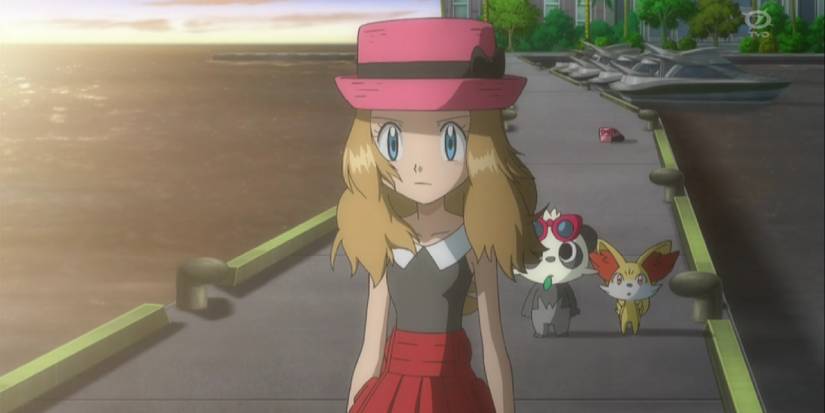 Serena walking on the pier where she cuts her hair in front of Pancham and Fennekin