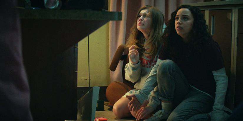 Sam and Deena looking scared in Fear Street 1994