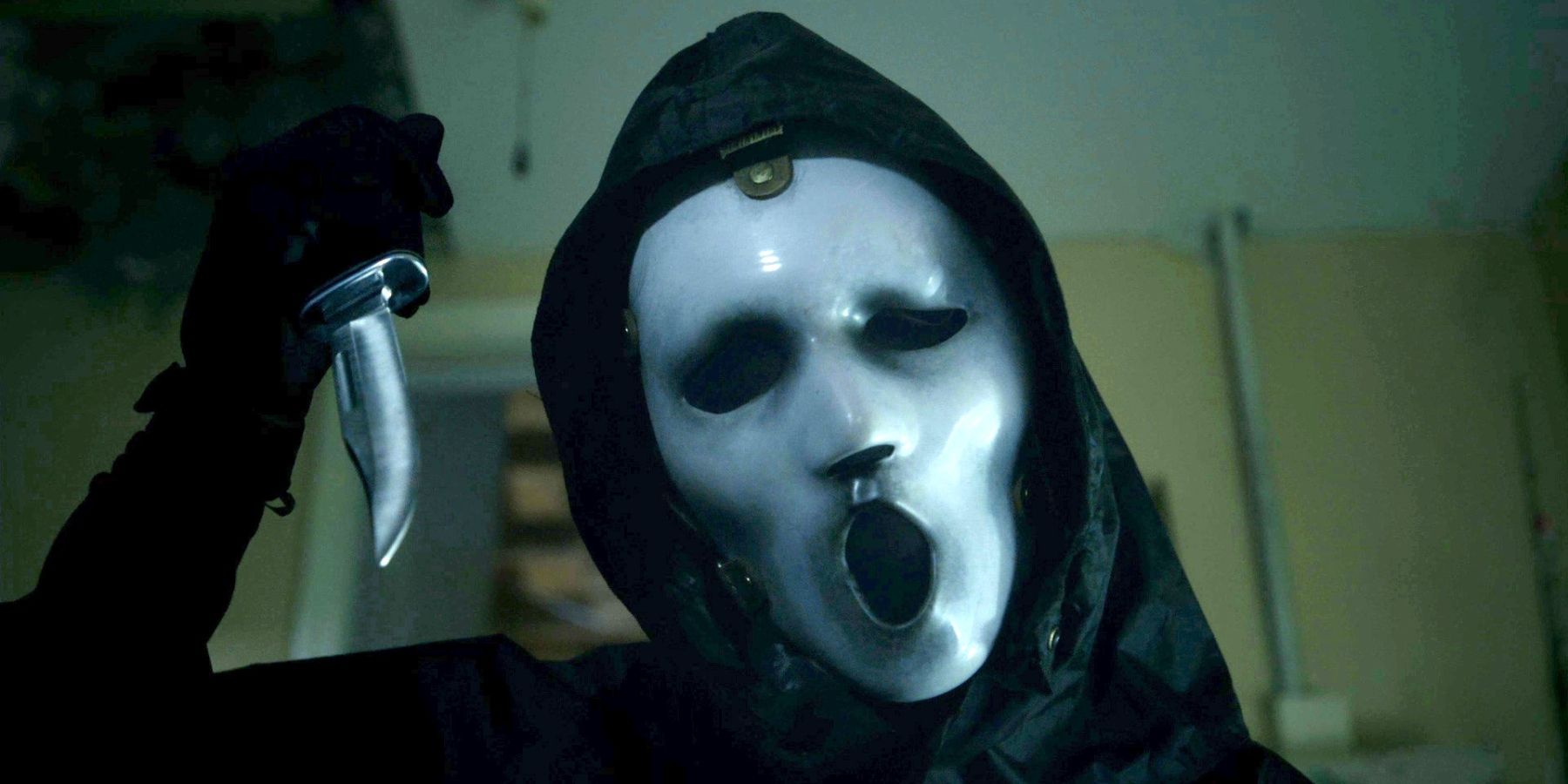 Ghostface holding up a knife in Scream MTV Featured Image