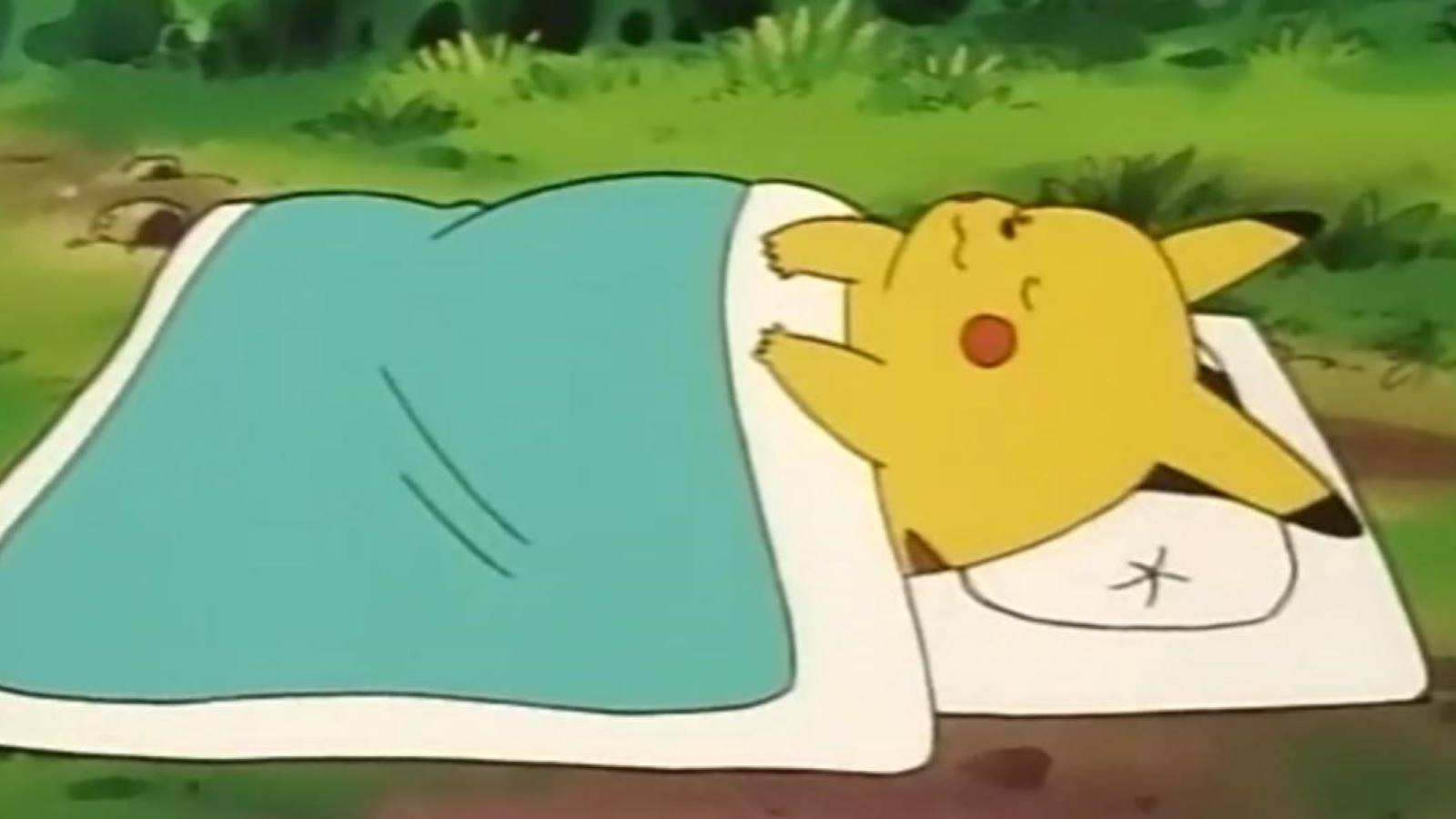Pikachu sleeping under a blanket in the Pokemon anime