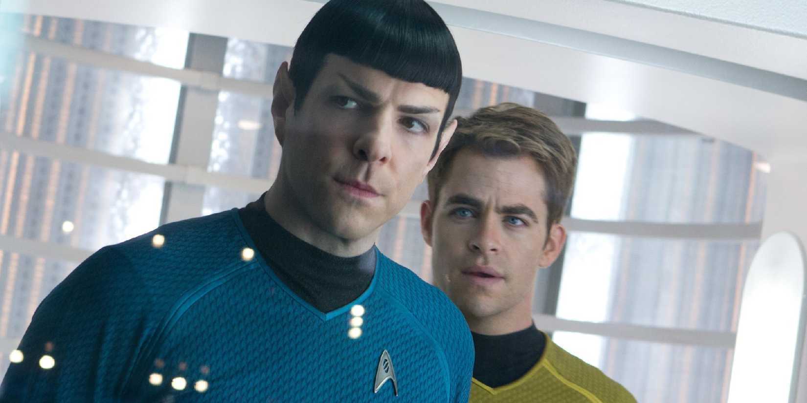 Kirk and Spock looking at something on the Enterprise in Star Trek Into Darkness