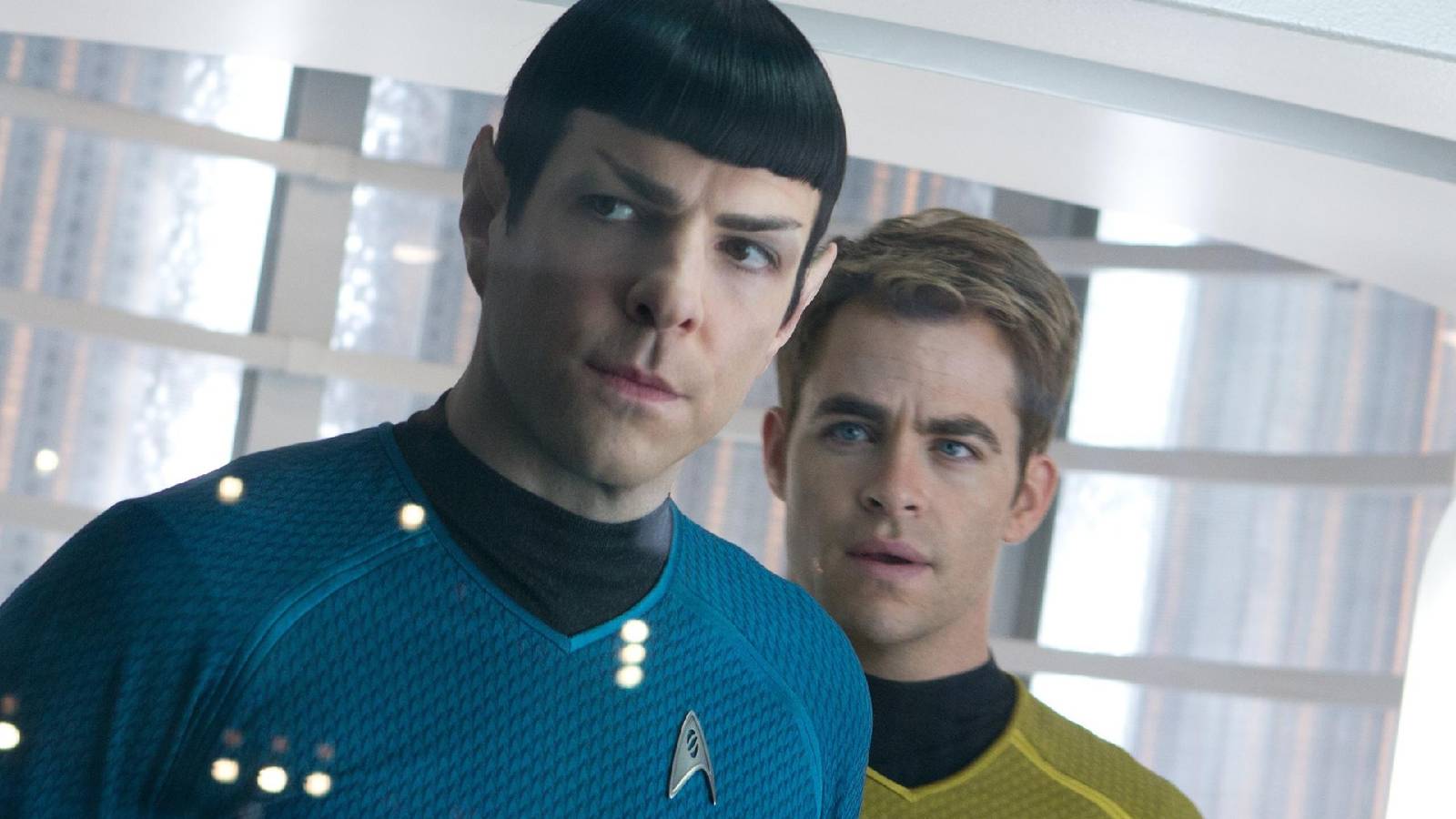 Kirk and Spock looking at something on the Enterprise in Star Trek Into Darkness