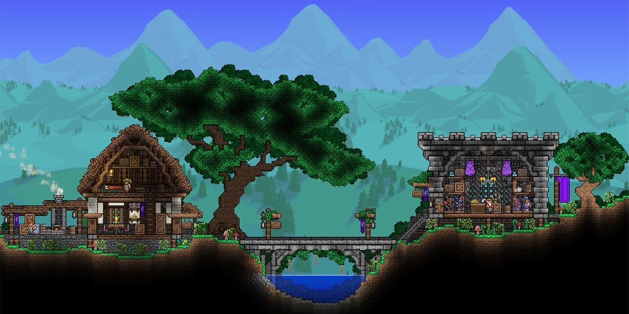 Two houses, one made of wood the other made of stone, in the game Terraria. A bridge connects them over water.