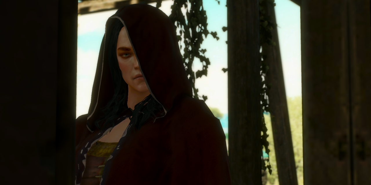The Bruxa at Corvo Bianco in cloak at the inn in The Witcher 3