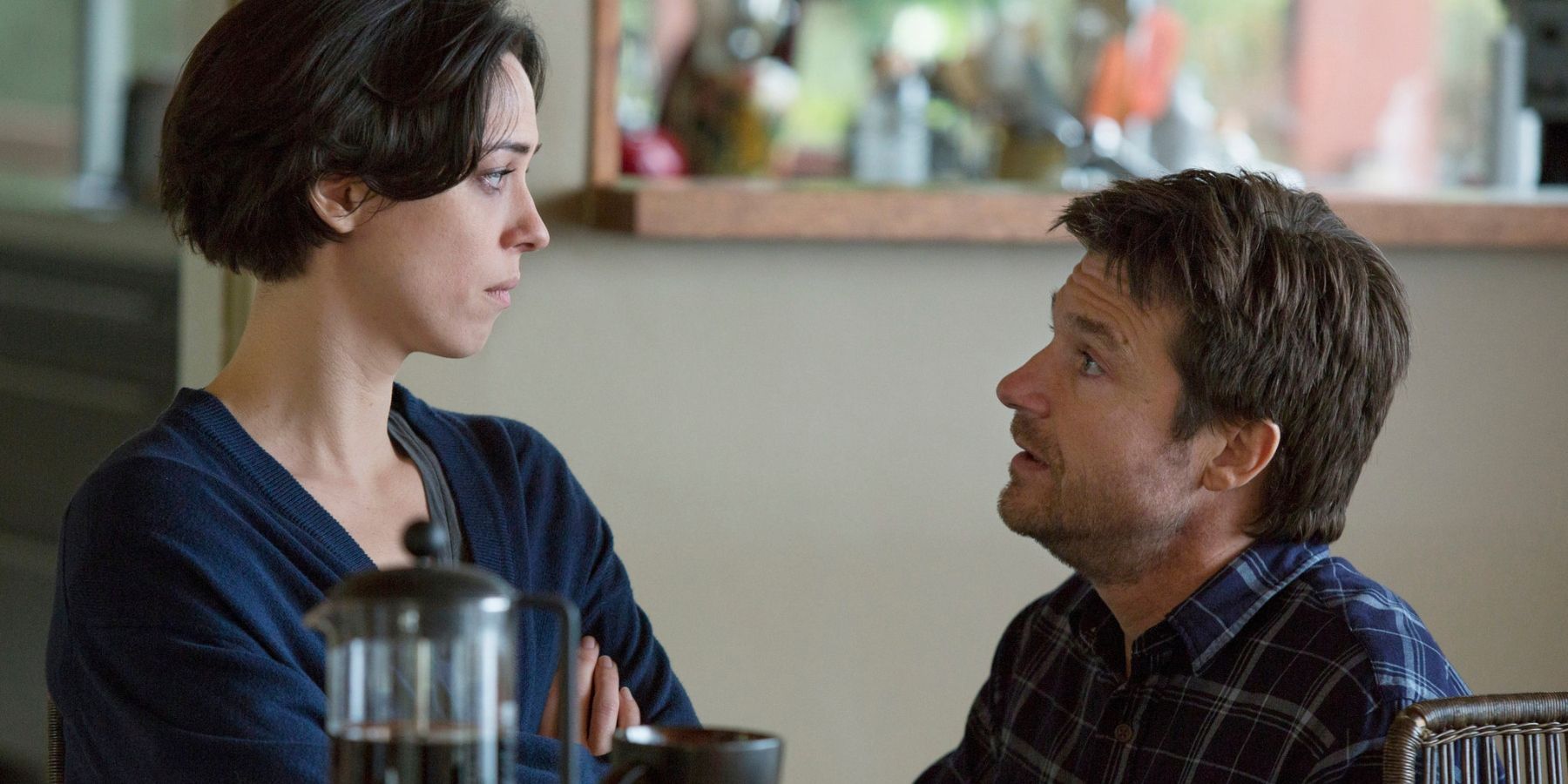 Jason Bateman and Rebecca Hall look at each other in The Gift