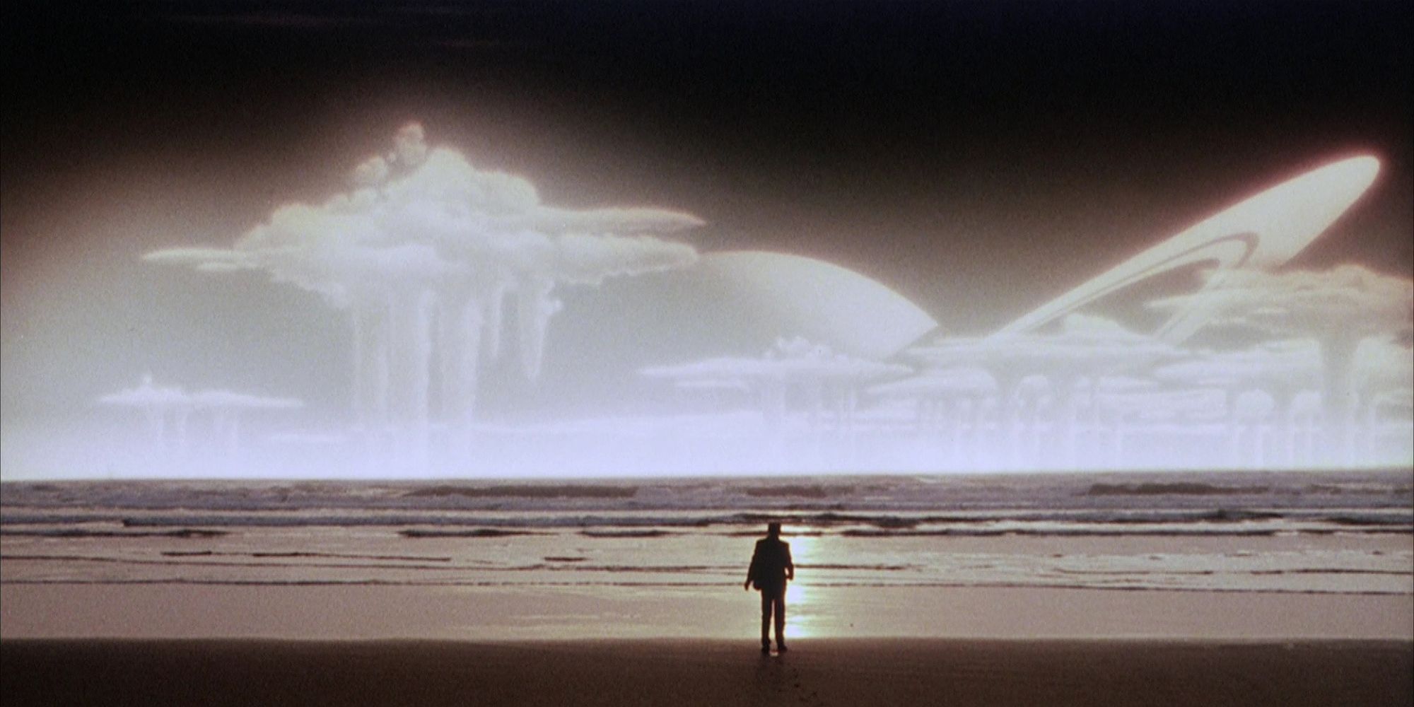 The main character watches a planet rise over the horizon in The Quiet Earth