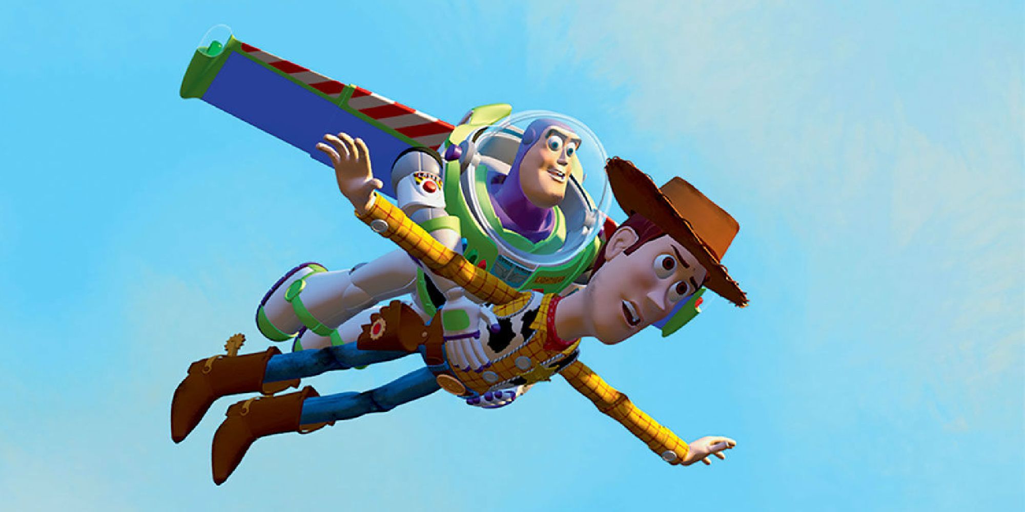 Buzz holding Woody as they fly towards Andy's moving truck