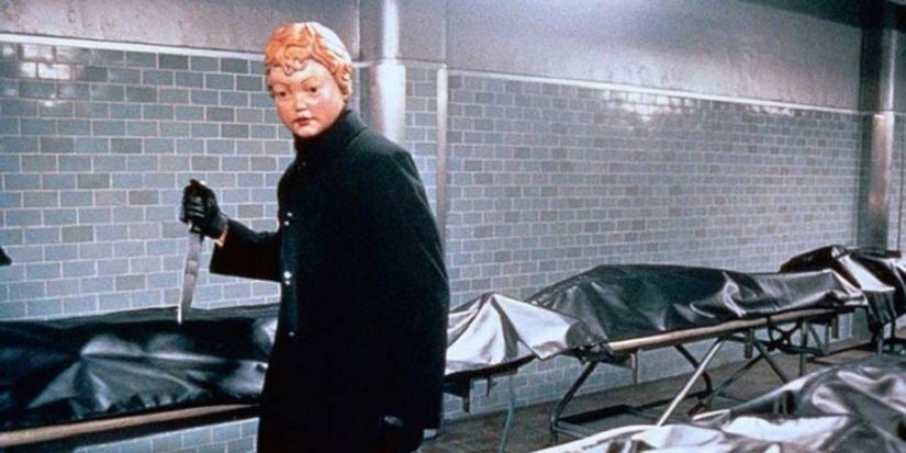 The killer in a black cloak and mask with a knife in Valentine