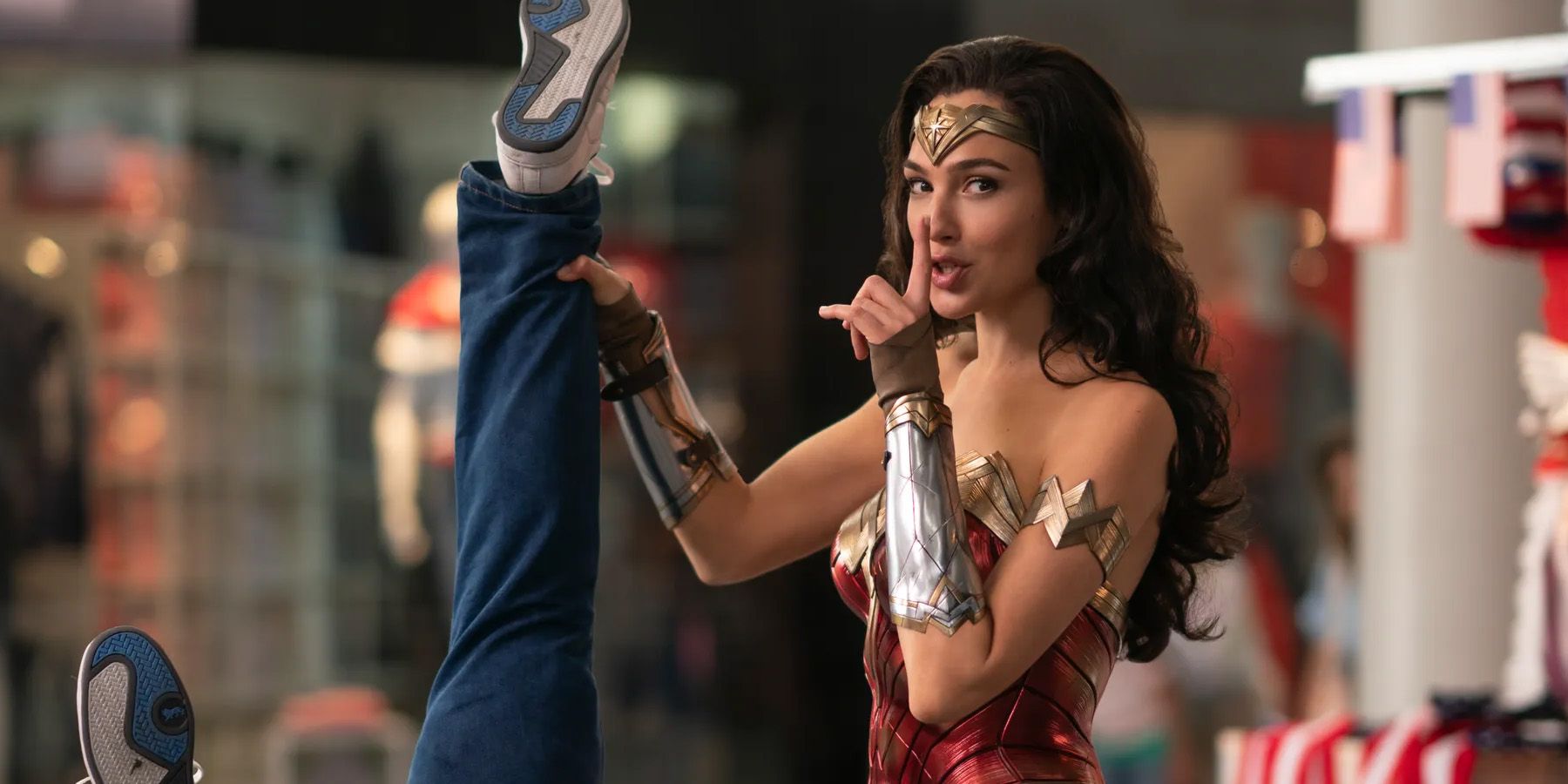 Wonder Woman 1984 diana holding man