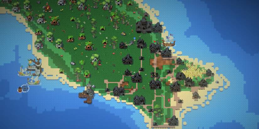 A wrecked human village in Worldbox - God Simulator