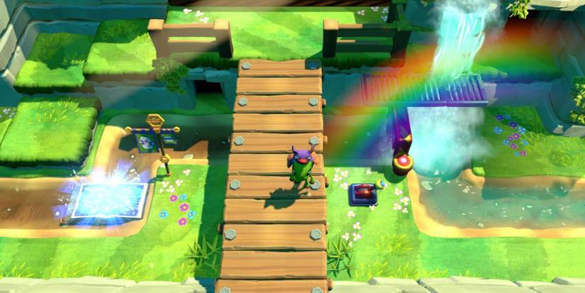 Yooka Laylee - Yooka and Laylee walking down a bridge.