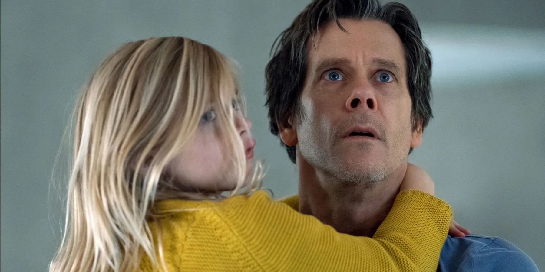 Kevin Bacon as Theo holding Avery Essex as Ella in You Should Have Left