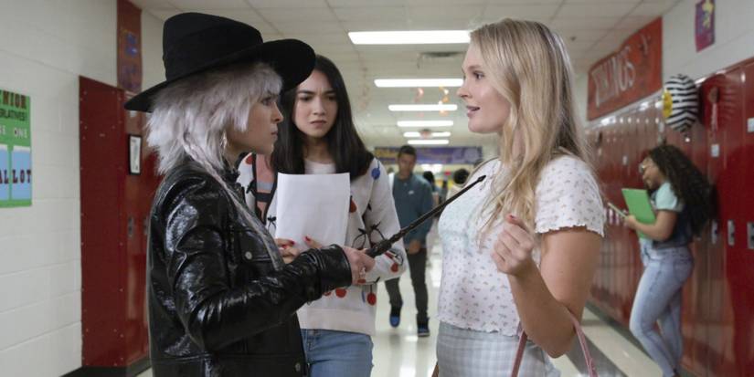 Jy Prishkulnik as Luna talking to a popular girl at school in Just Beyond