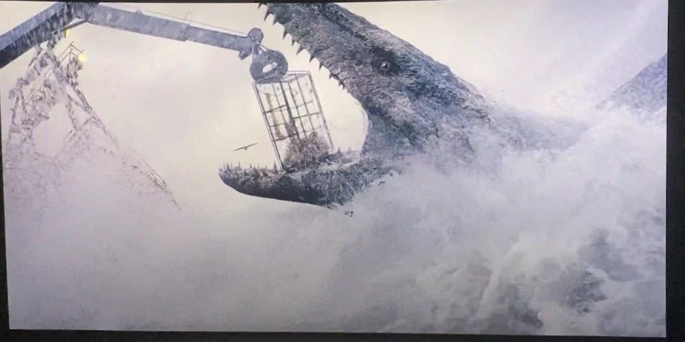 Image of the Mosasaurus attacking a fishing boat in Jurassic World Dominion.