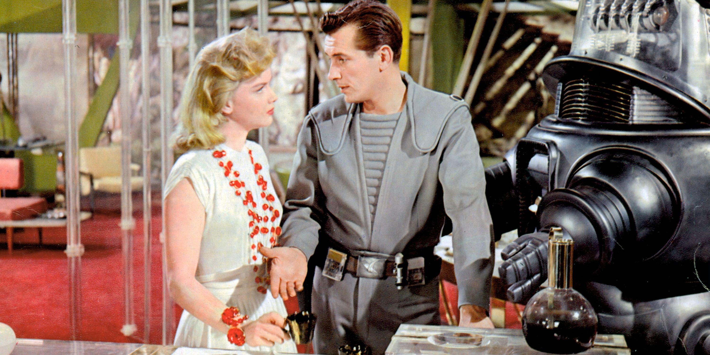 запретная планета 1956 скриншот главные герои с роботом