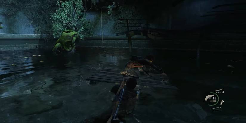 Joel pushing Ellie on a plank of wood