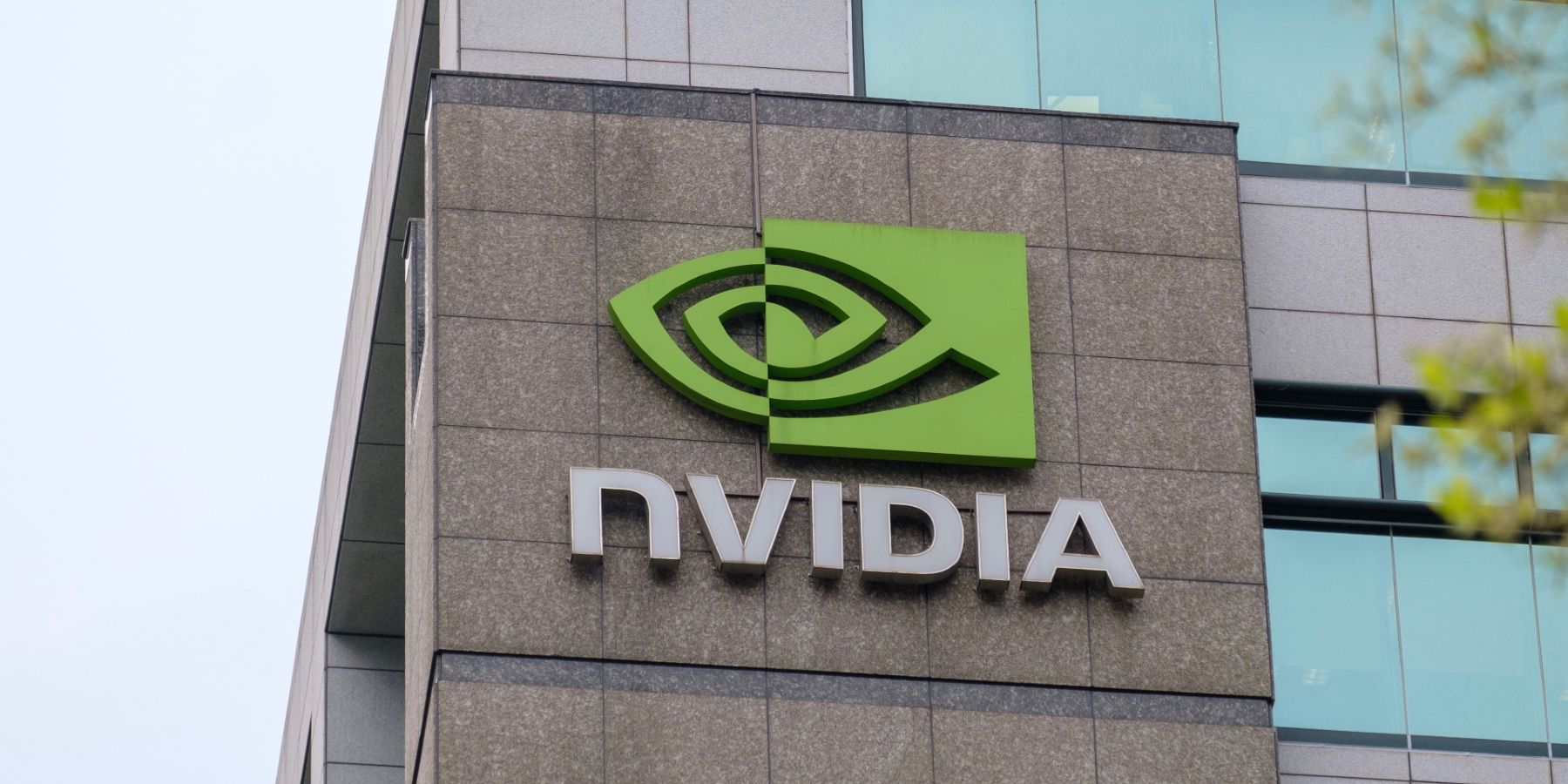 Photo of the Nvidia logo on the side of the company headquarters..