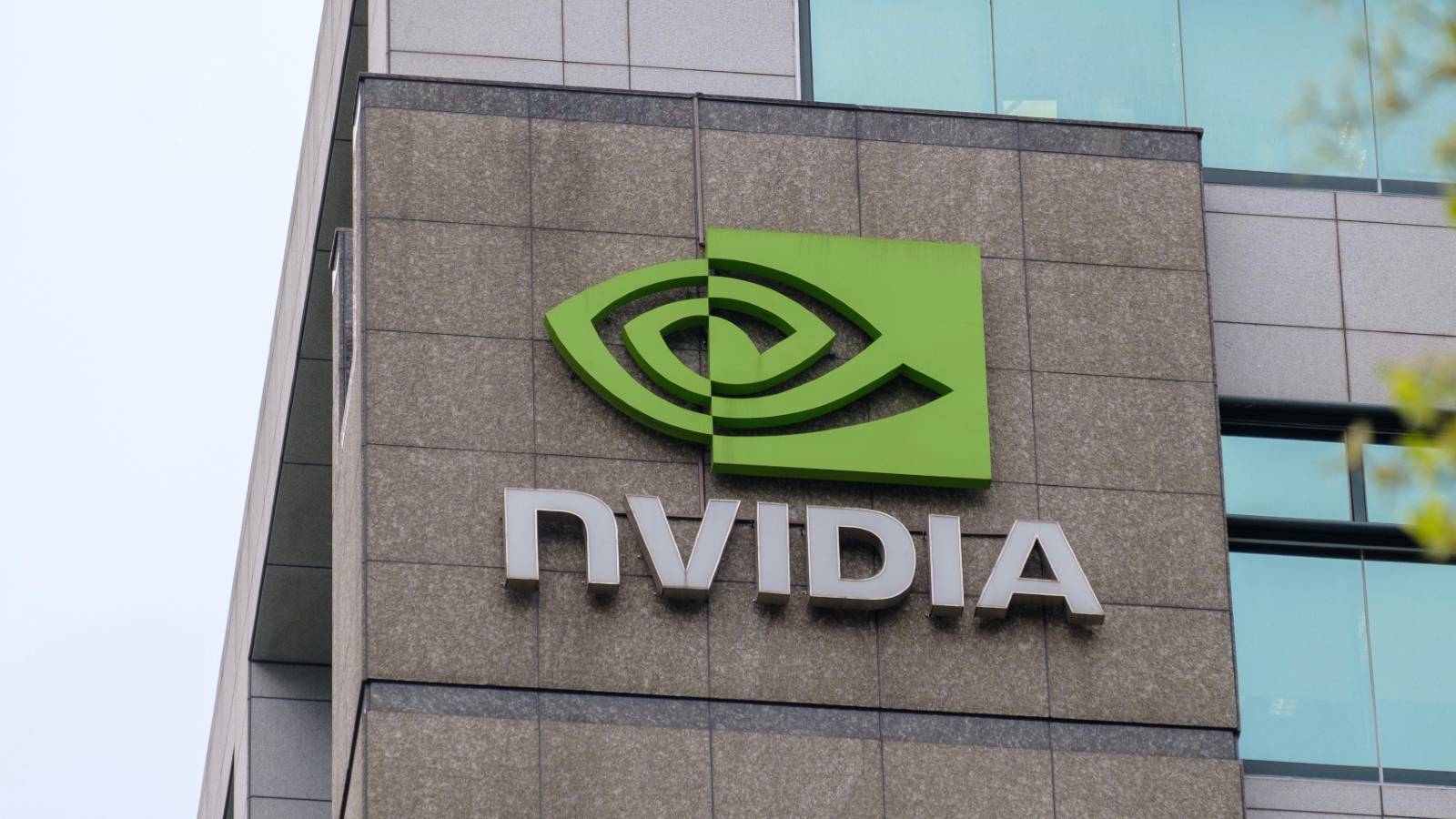 Photo of the Nvidia logo on the side of the company headquarters..