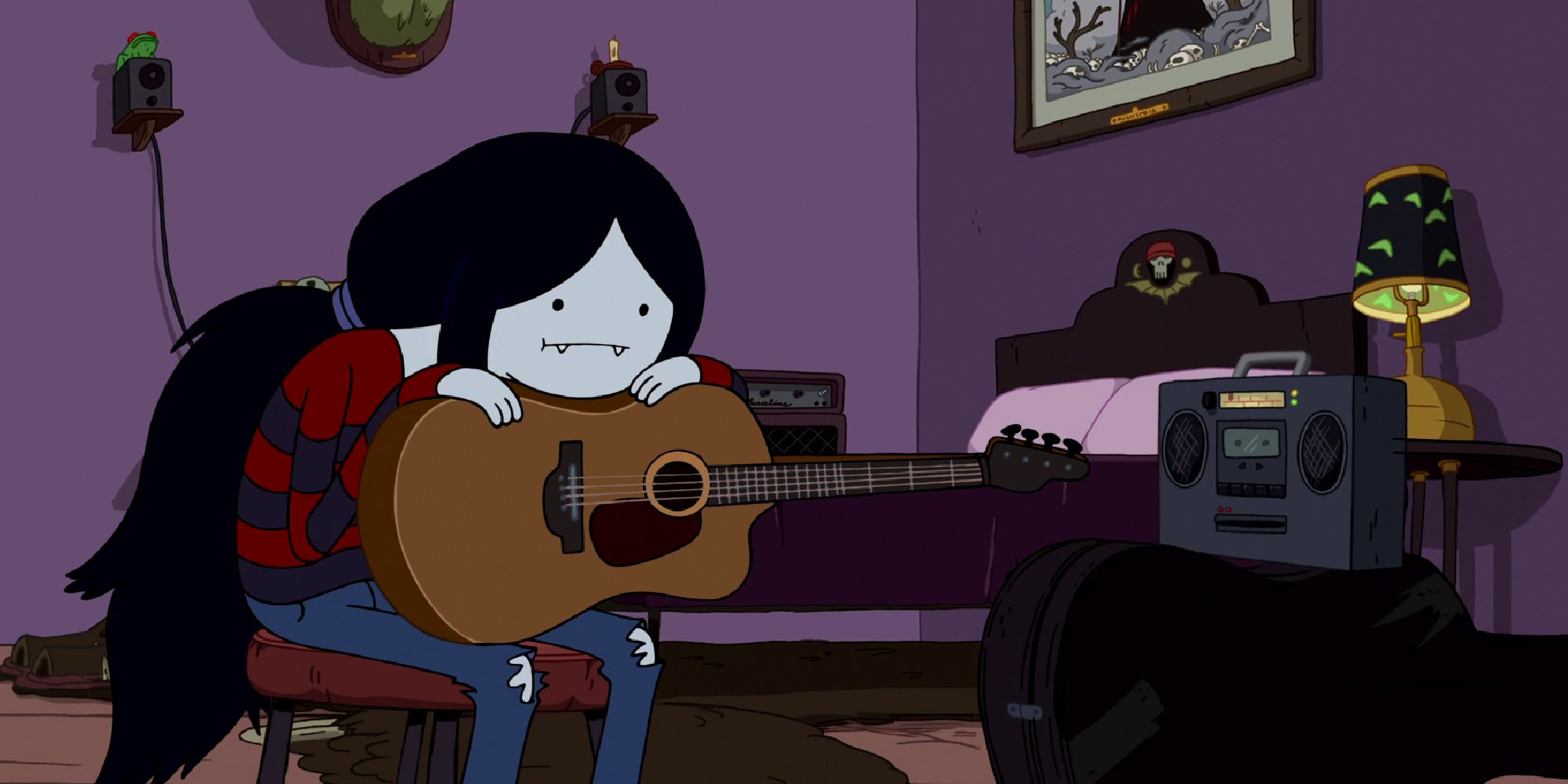 Marceline sitting at her guitar while staring at a boombox
