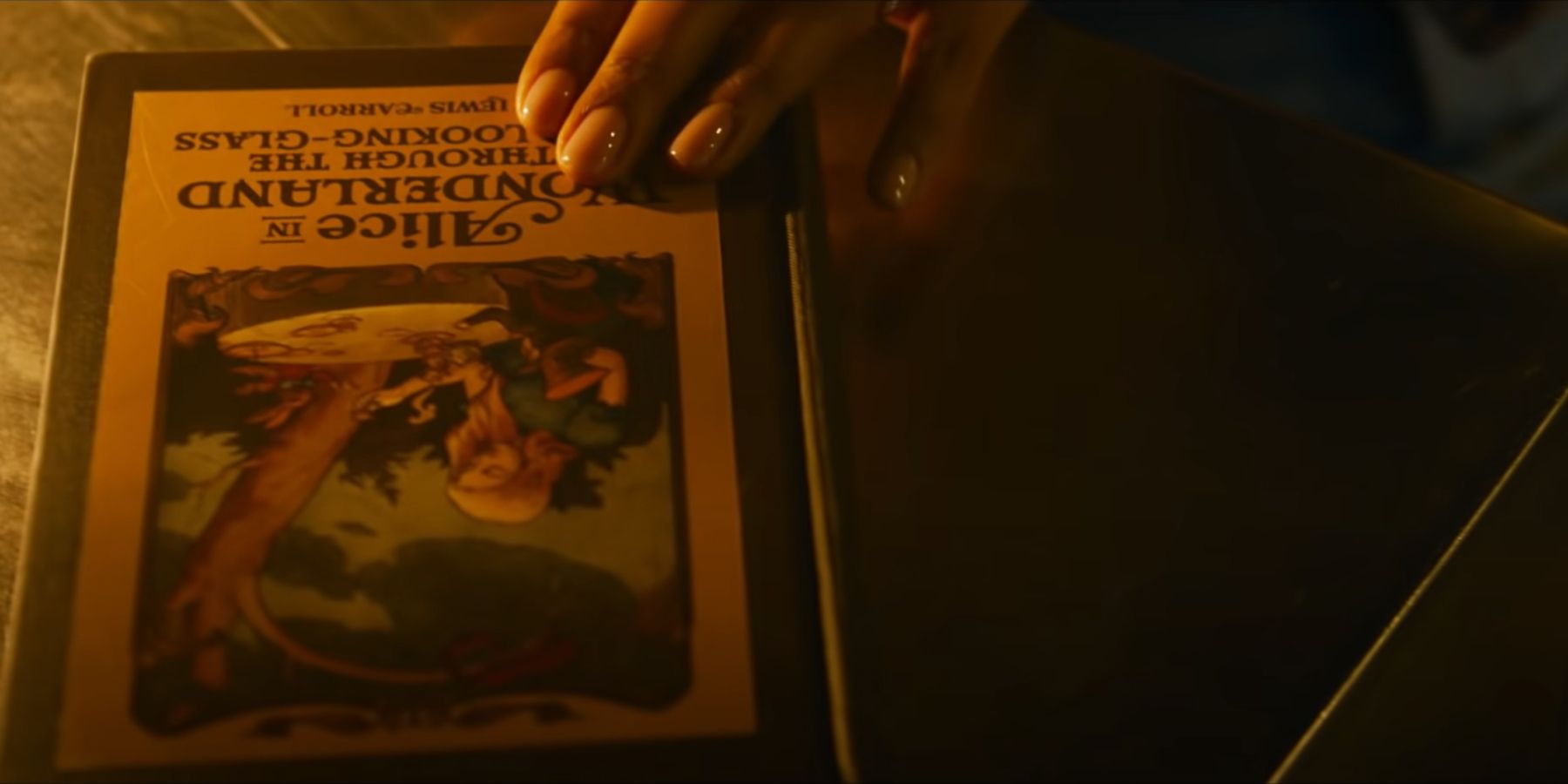 Alice in Wonderland book appearing in the Matrix