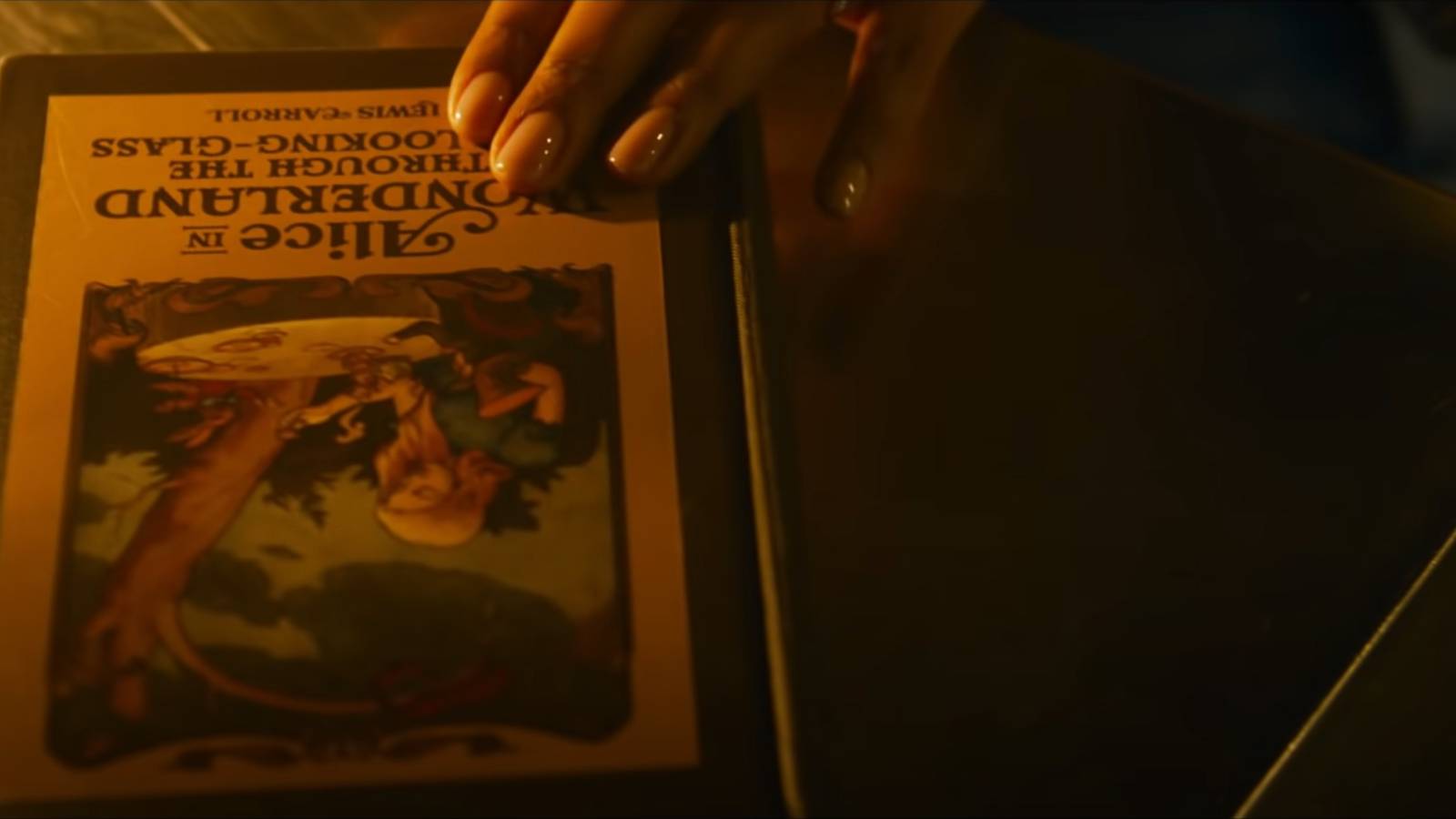 Alice in Wonderland book appearing in the Matrix