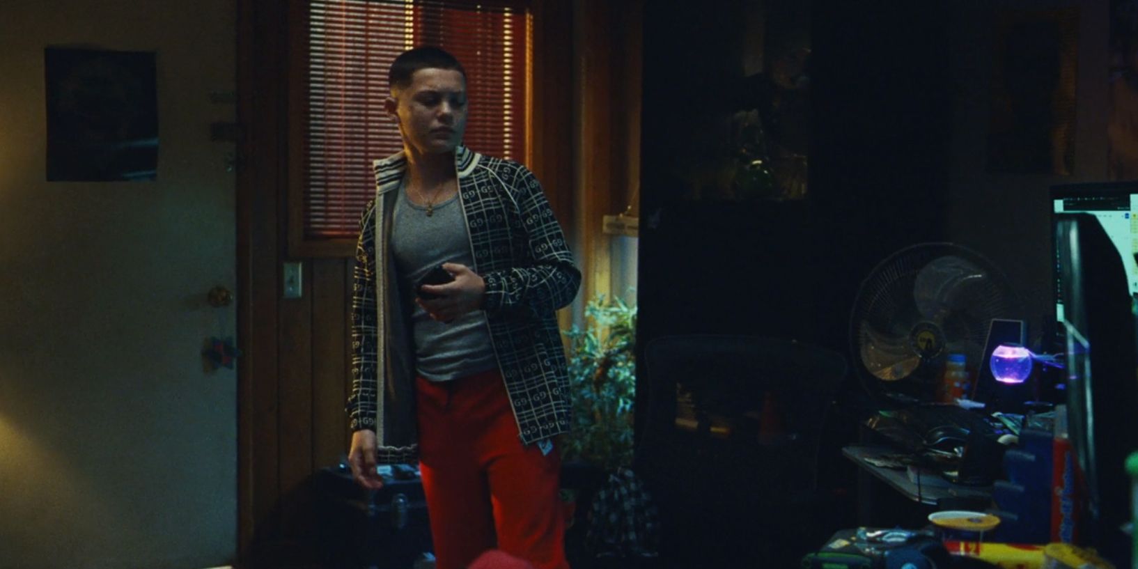Ashtray wearing a Gucci jacket and red jeans in Euphoria Season 2