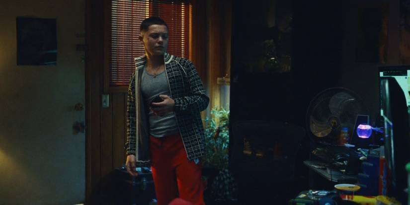 Ashtray wearing a Gucci jacket and red jeans in Euphoria Season 2