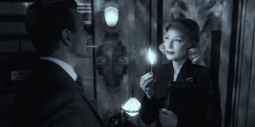 Stan and Lilith smoking in Nightmare Alley Visions in Darkness and Light