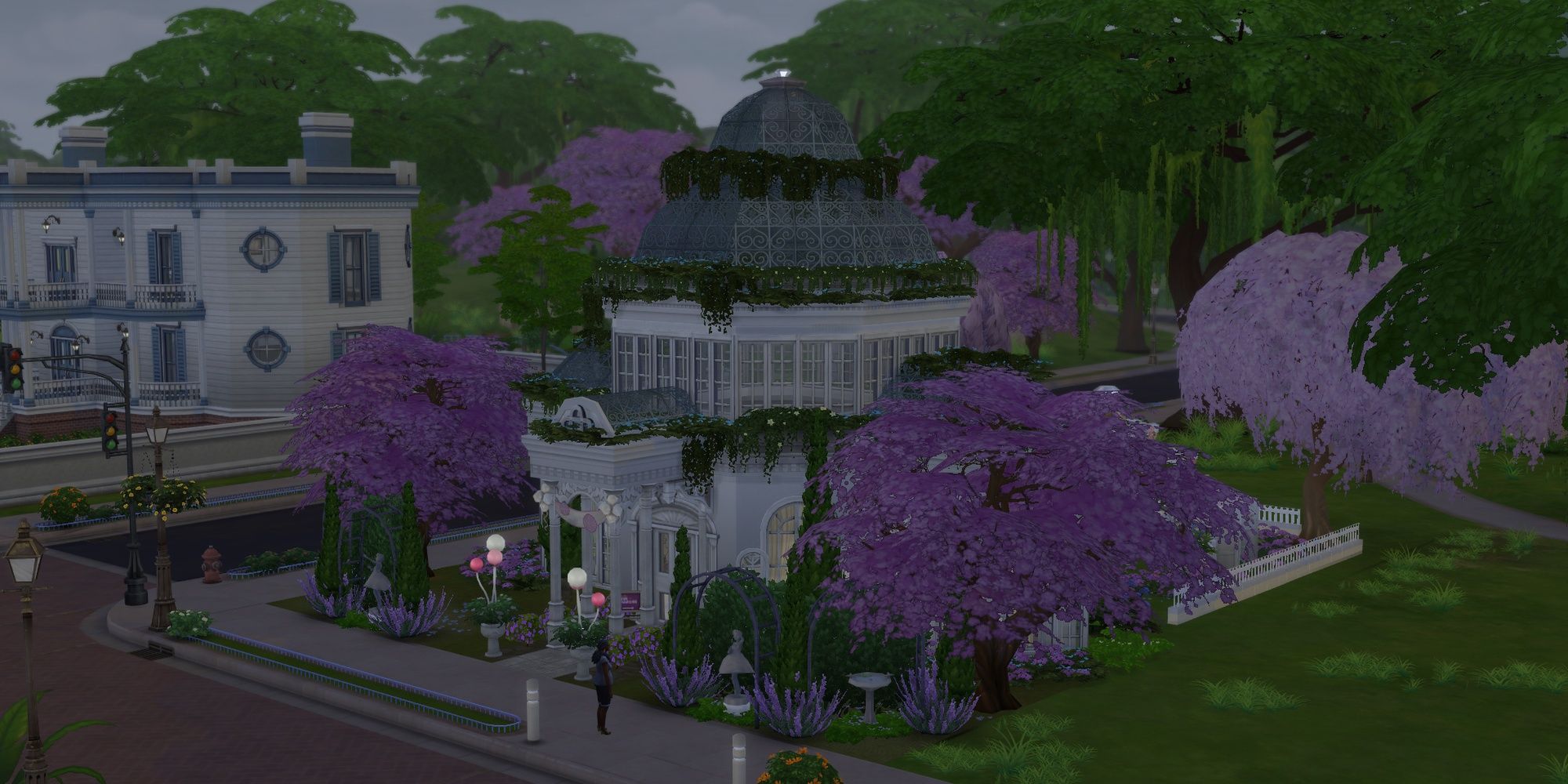 A white botanical garden building covered in plants in The Sims 4.