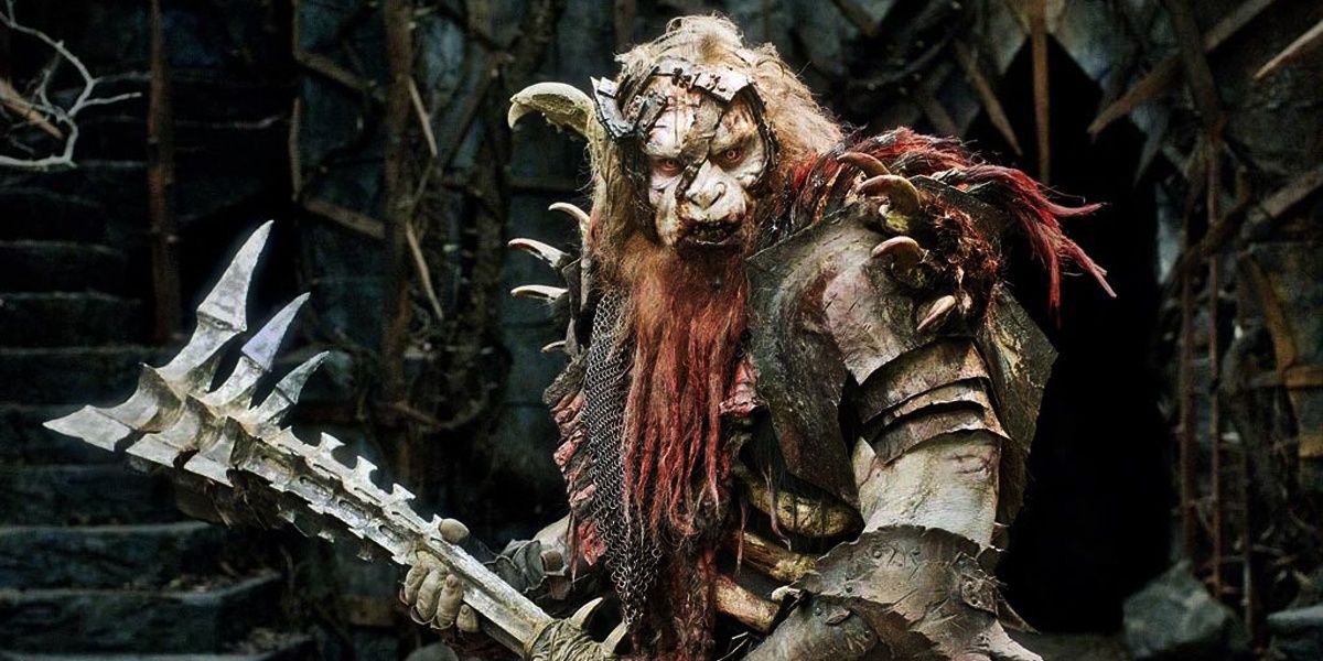 Bolg son of Azog from The Hobbit and Lord of the Rings carrying a war hammer