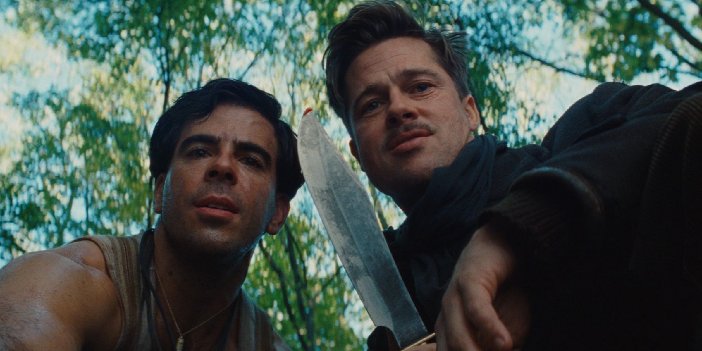 Brad Pitt and Eli Roth looking down at the camera in Inglourious Basterds