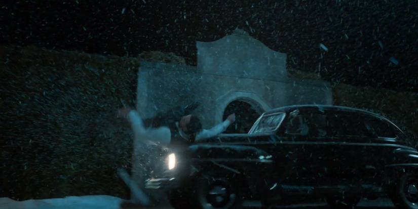 Anderson hit by a car driven by Stan (Bradley Cooper) in Nightmare Alley