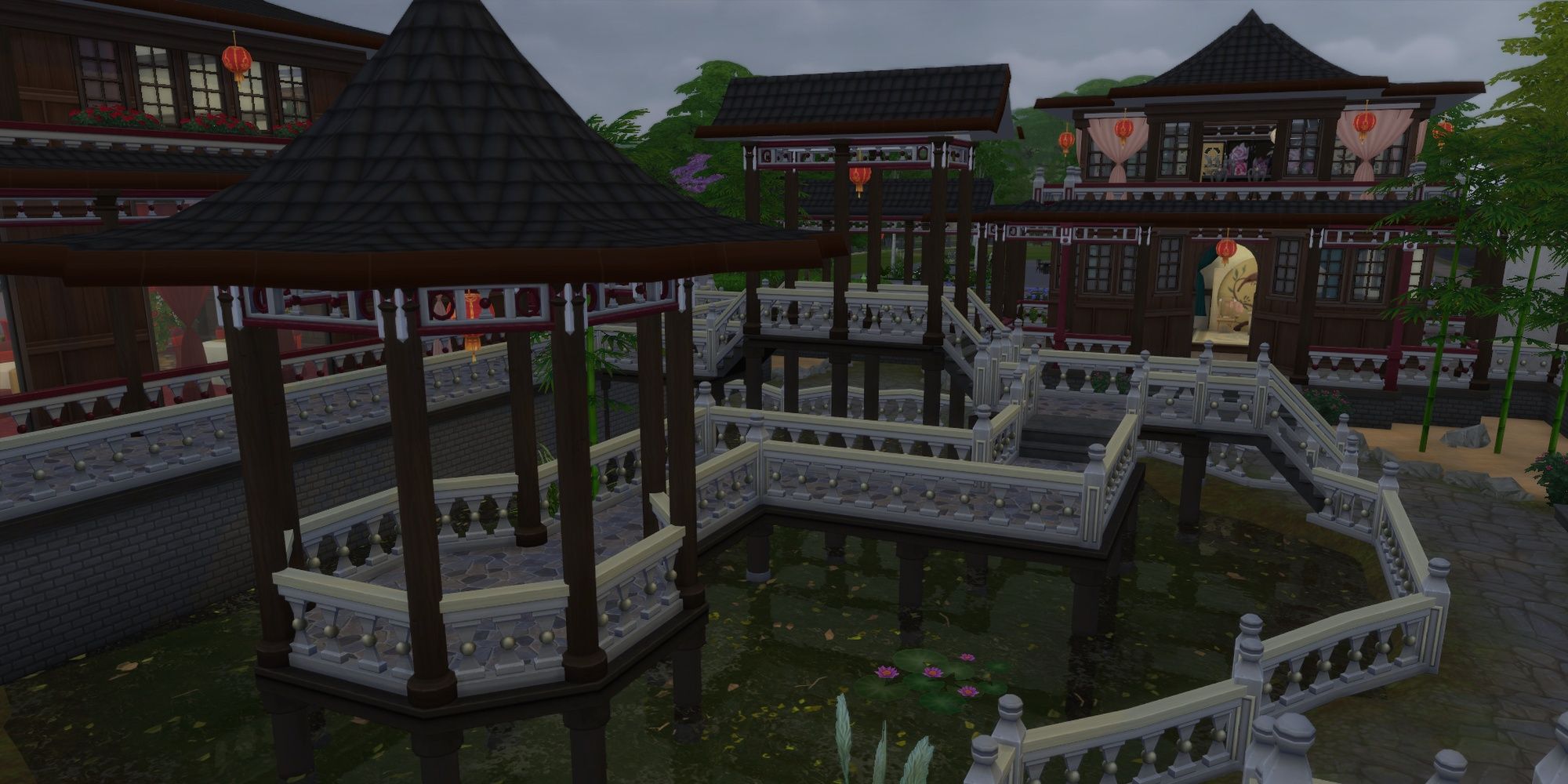 An east asian courtyard in The Sims 4 with a gazebo over a pond.