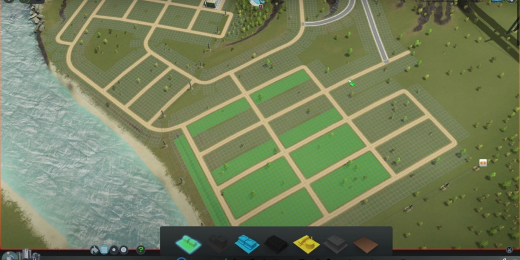 An early road layout being zoned in Cities: Skylines