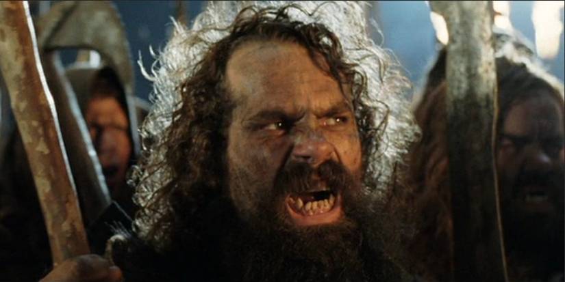 Dunlendings with torches and axes from Lord of the Rings The Two Towers