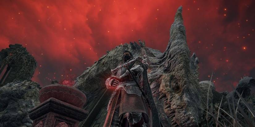 Tarnished wielding the Dragon Communion Seal in the Dragon Communion Church in Caelid