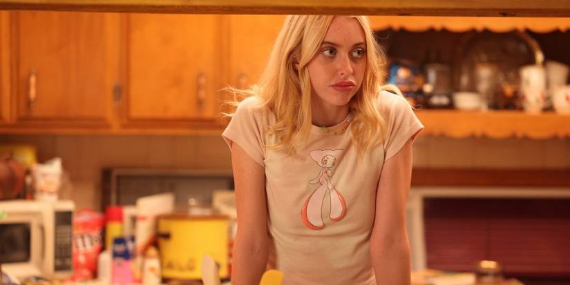 Faye wearing Unif anime style baby tee in Euphoria Season 2 at Fez's apartment