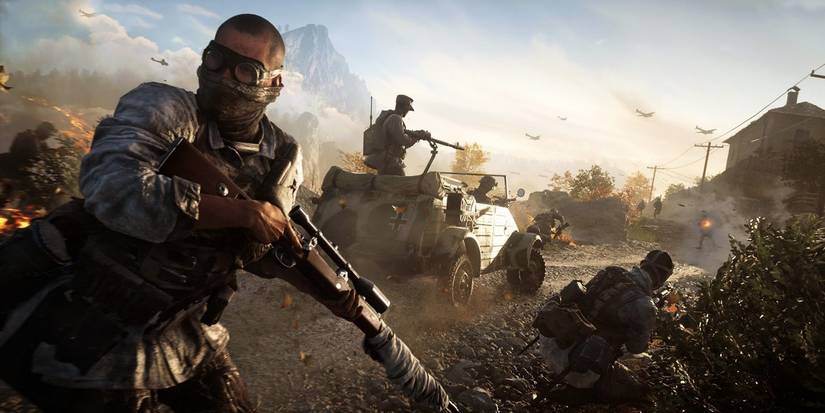 A World War 2 sniper with fellow soldiers and a jeep gunner, in Battlefield 5