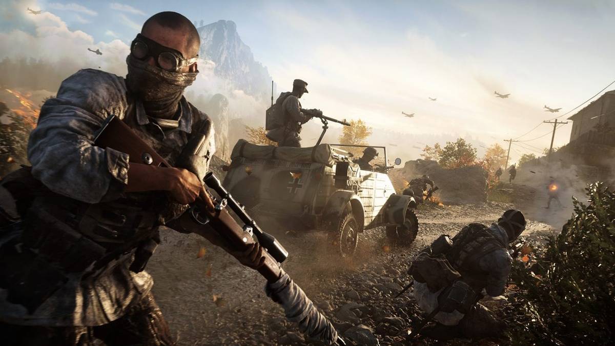 A World War 2 sniper with fellow soldiers and a jeep gunner, in Battlefield 5