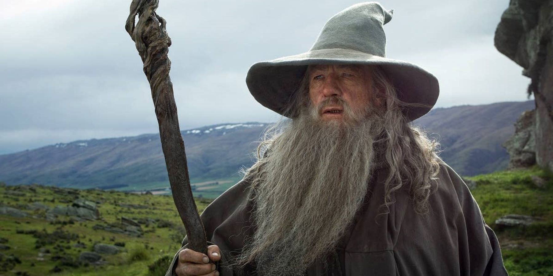 Ian McKellen's Gandalf frowning and holding his staff in The Hobbit