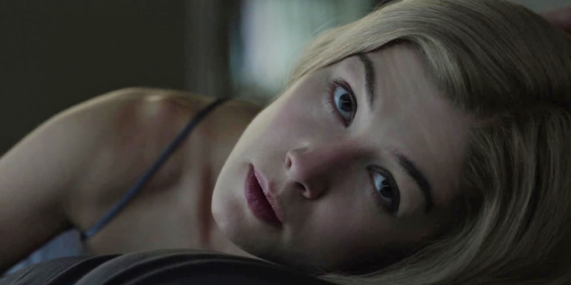 Rosamund Pike as Amy Dunne lying down in Gone Girl