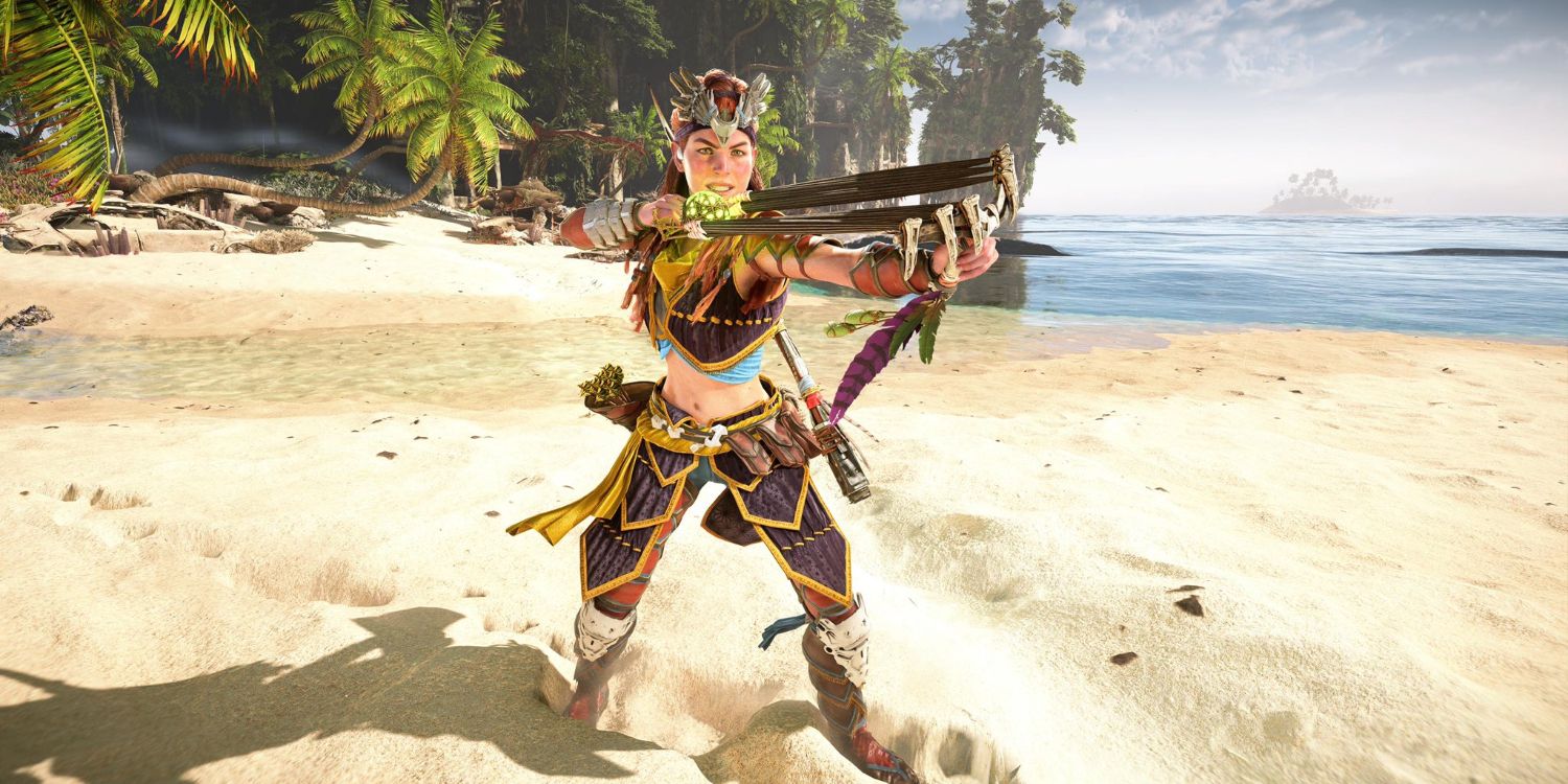 aloy in a red and yellow outfit on a beach pulling back on a sling loaded with a greenish ball