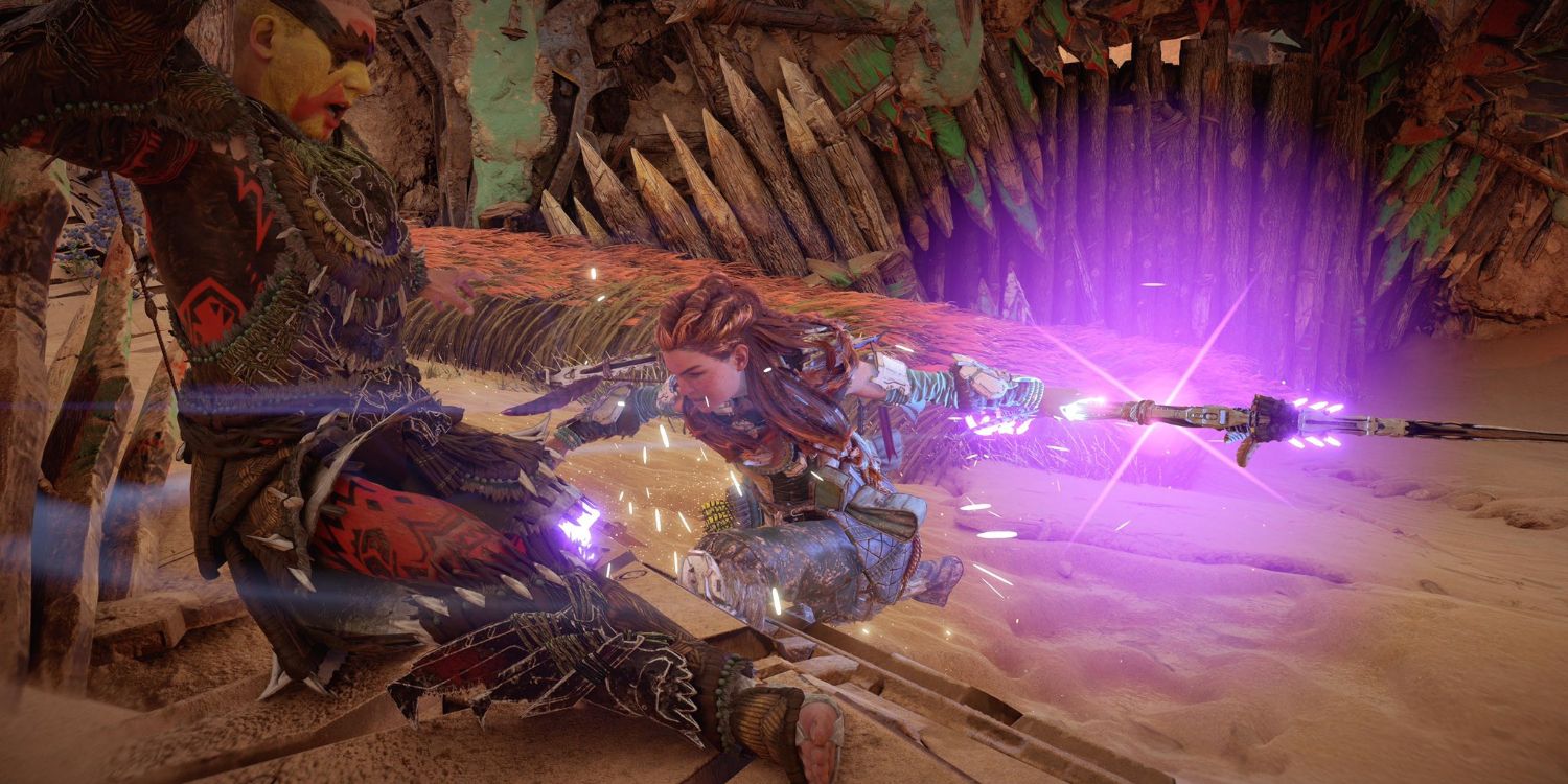 aloy, in a desert camp with wooden structures, striking a man in dark armor with her spear that's glowing purple