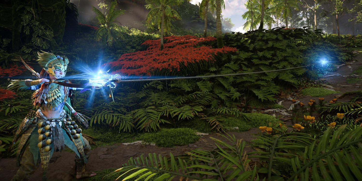 aloy in a green and yellow outfit with an ornate headdress firing a small crossbow with a glowing blue light on it and rope attached to another blue light on the ground in front of her