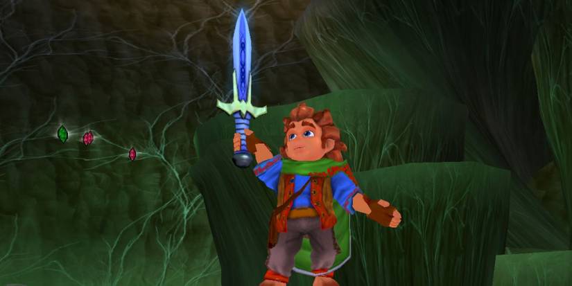 Bilbo Baggins holding up Sting in 2003's The Hobbit by Sierra